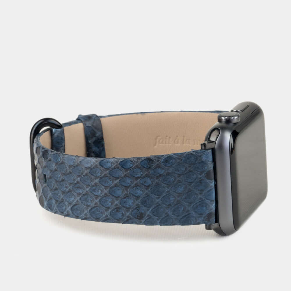 Strap for the Apple Watch 41/42 mm in blue python leather, with black adapters and buckle | close-up on the inner lining leather and the brand stamp