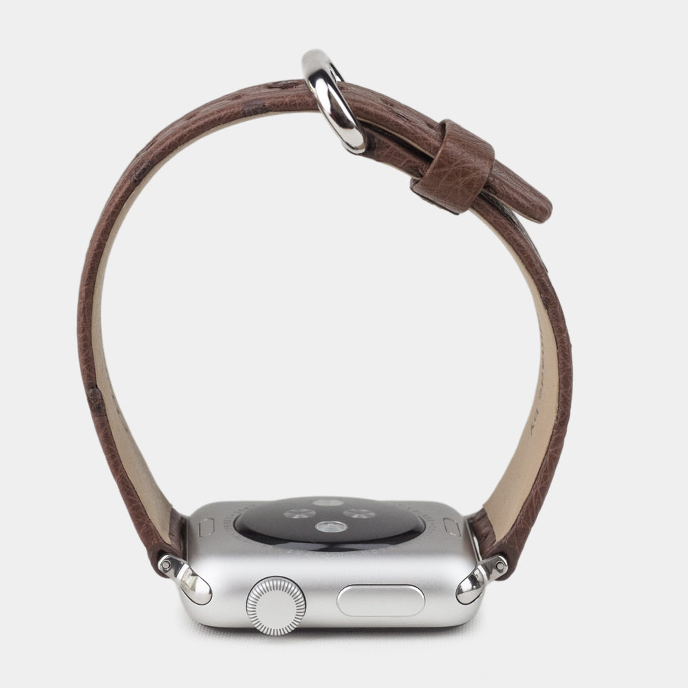 brown ostrich strap apple watch with steel adapters and buckle profile view