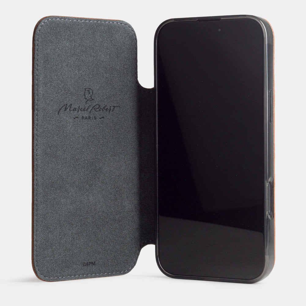 Open view of Marcel Robert iPhone 17 folio case in gold calfskin leather, grey Alcantara lining