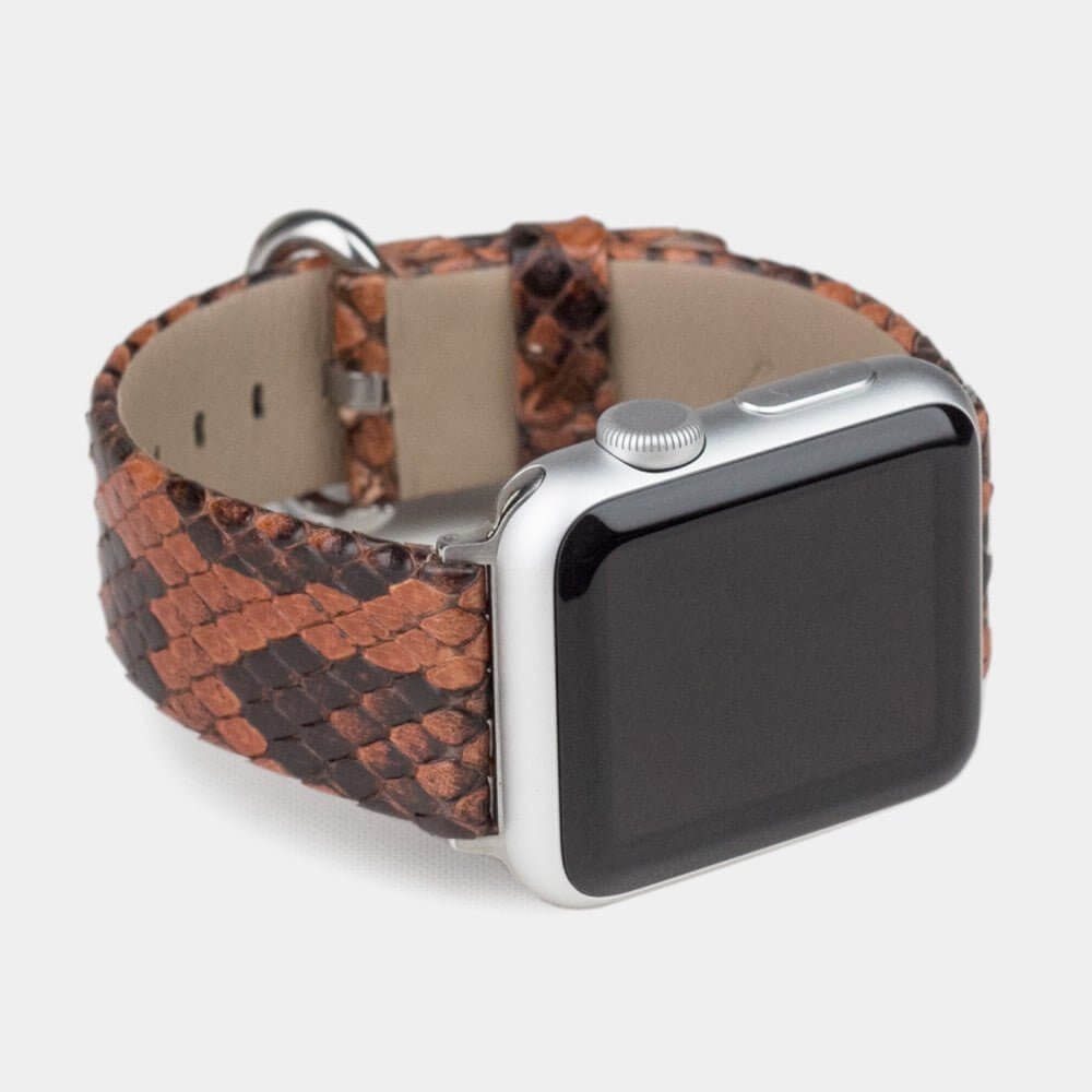 Strap for the Apple Watch 41/42 mm in Gold python leather, with steel adapters and buckle | 3/4 profile view to see the inner lining leather