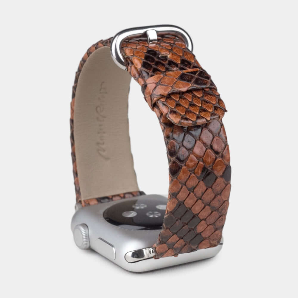 gold python strap apple watch with steel adapters and buckle upper view