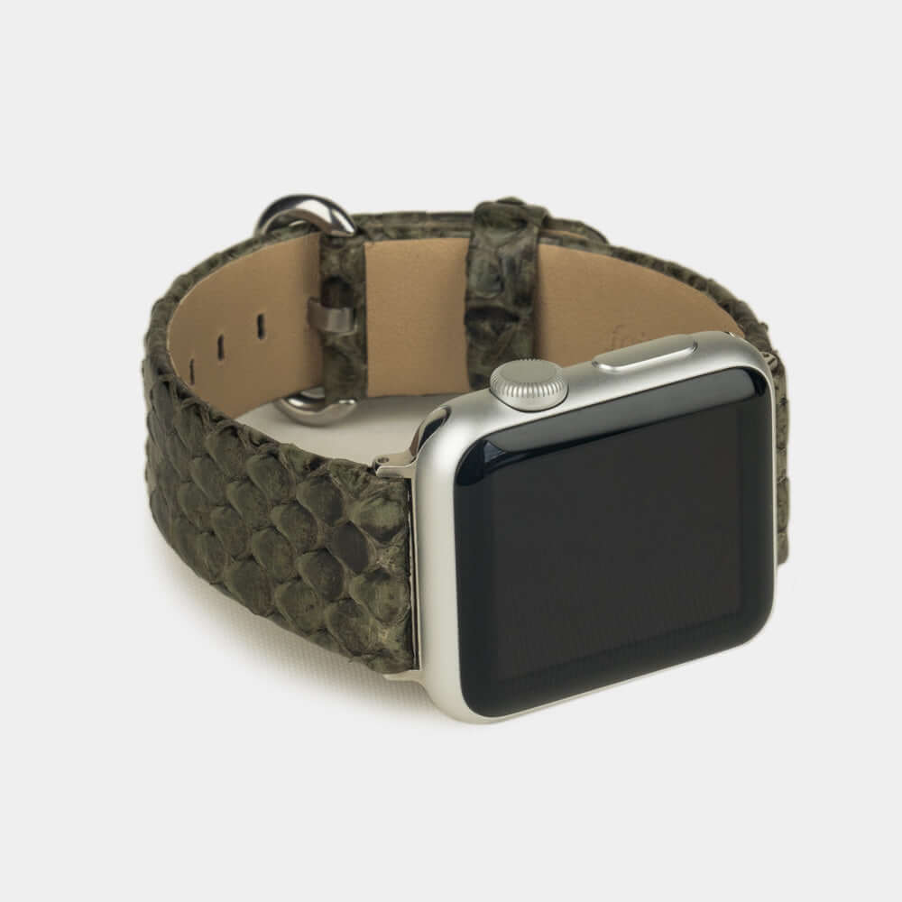 Strap for the Apple Watch 41/42 mm in green python leather, with steel adapters and buckle | 3/4 profile view to see the inner lining leather