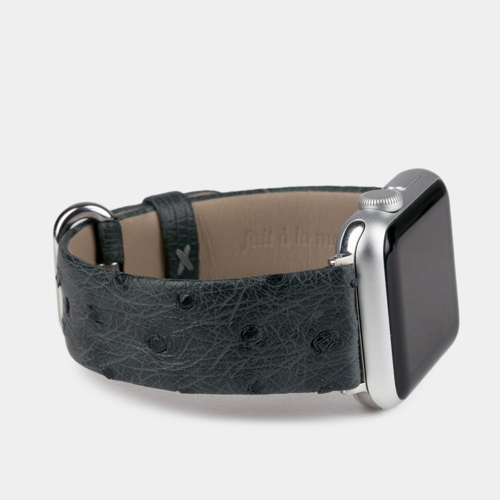 grey ostrich strap apple watch with steel adapters and buckle side view