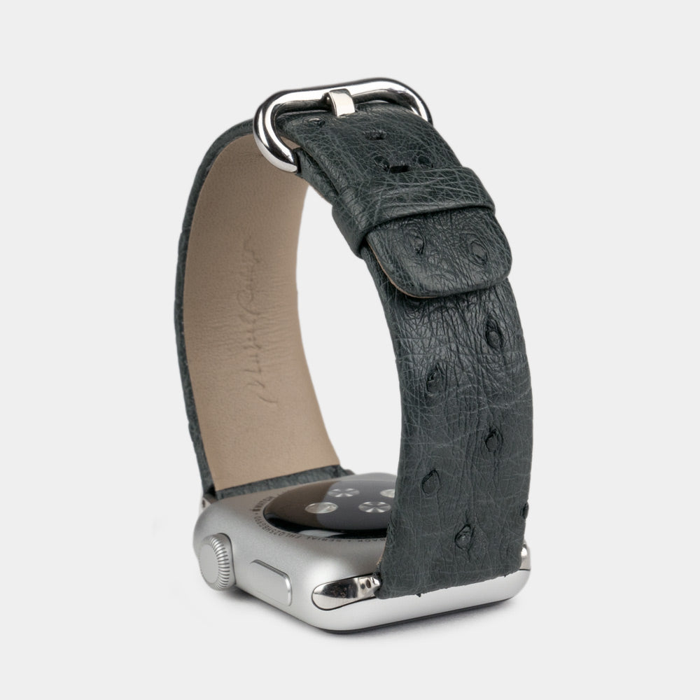grey ostrich strap apple watch with steel adapters and buckle upper view