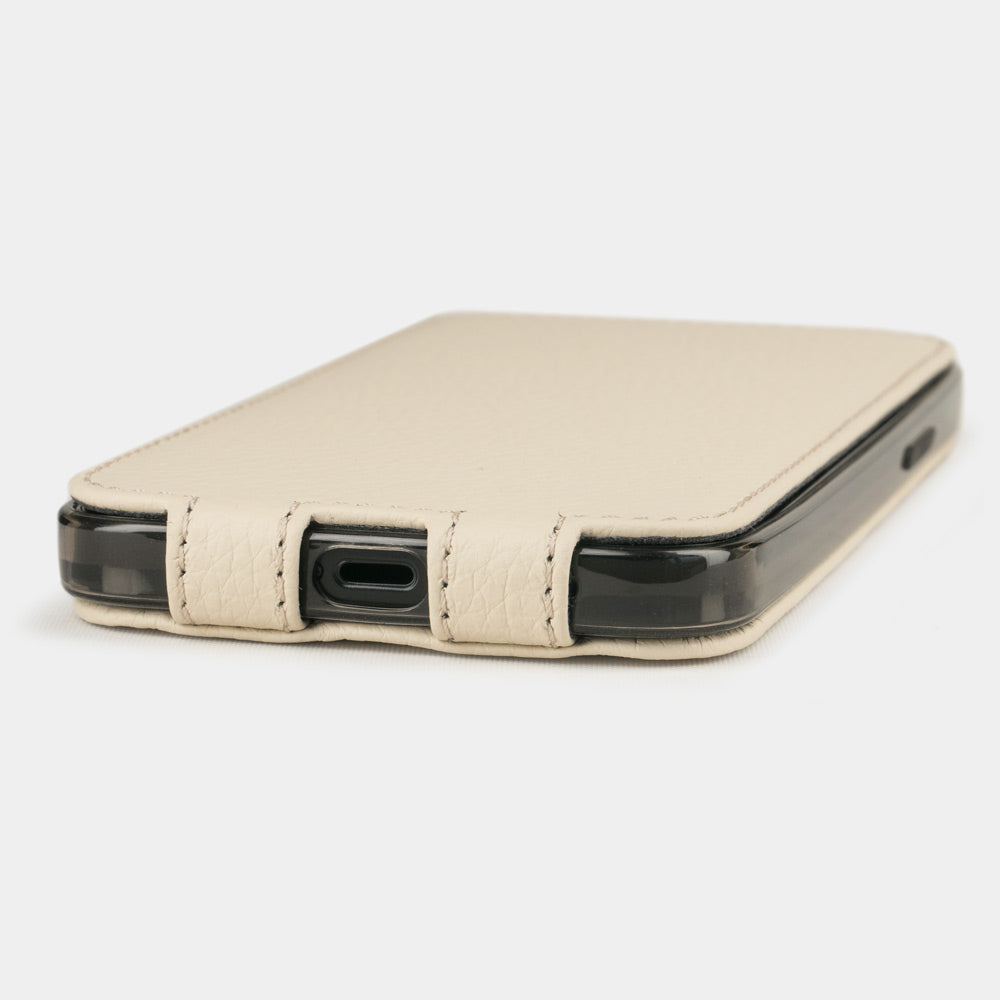 beige leather flip case for iPhone 12 mini, view of the case laid flat showing its slim profile