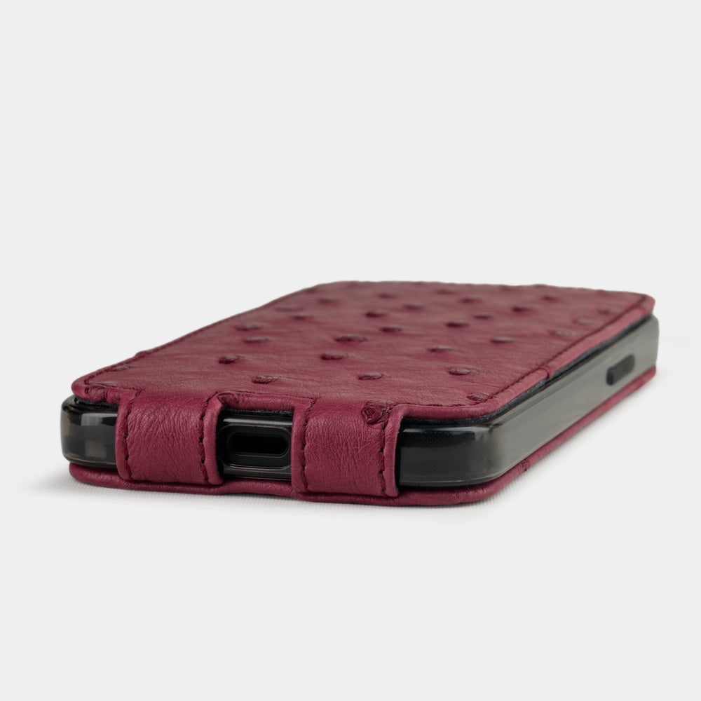 fuchsia ostrich leather flip case for iPhone 12 pro max, view of the case laid flat showing its slim profile