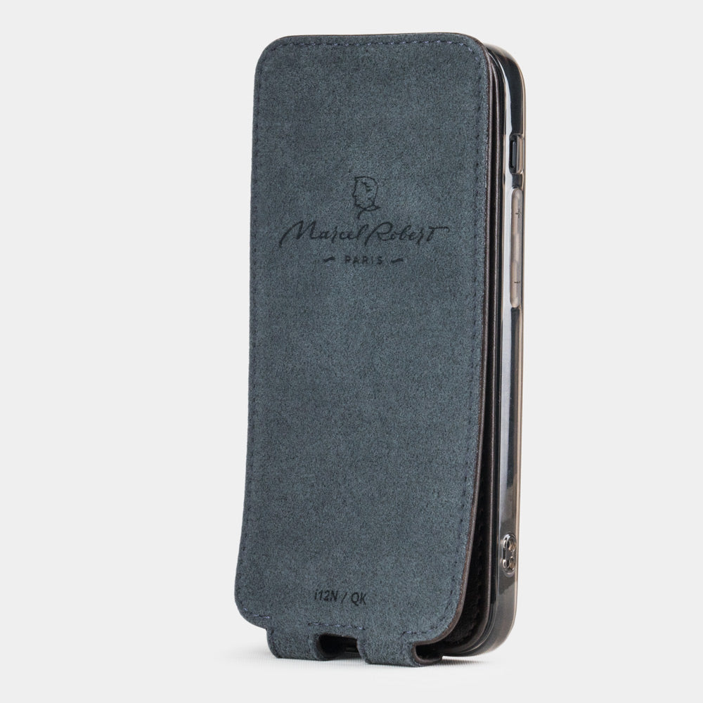 brown leather flip case for iPhone 12 Pro, vertical position, cover folded and secured to the back of the iPhone thanks to its integrated magnet system, revealing the grey microfiber lining
