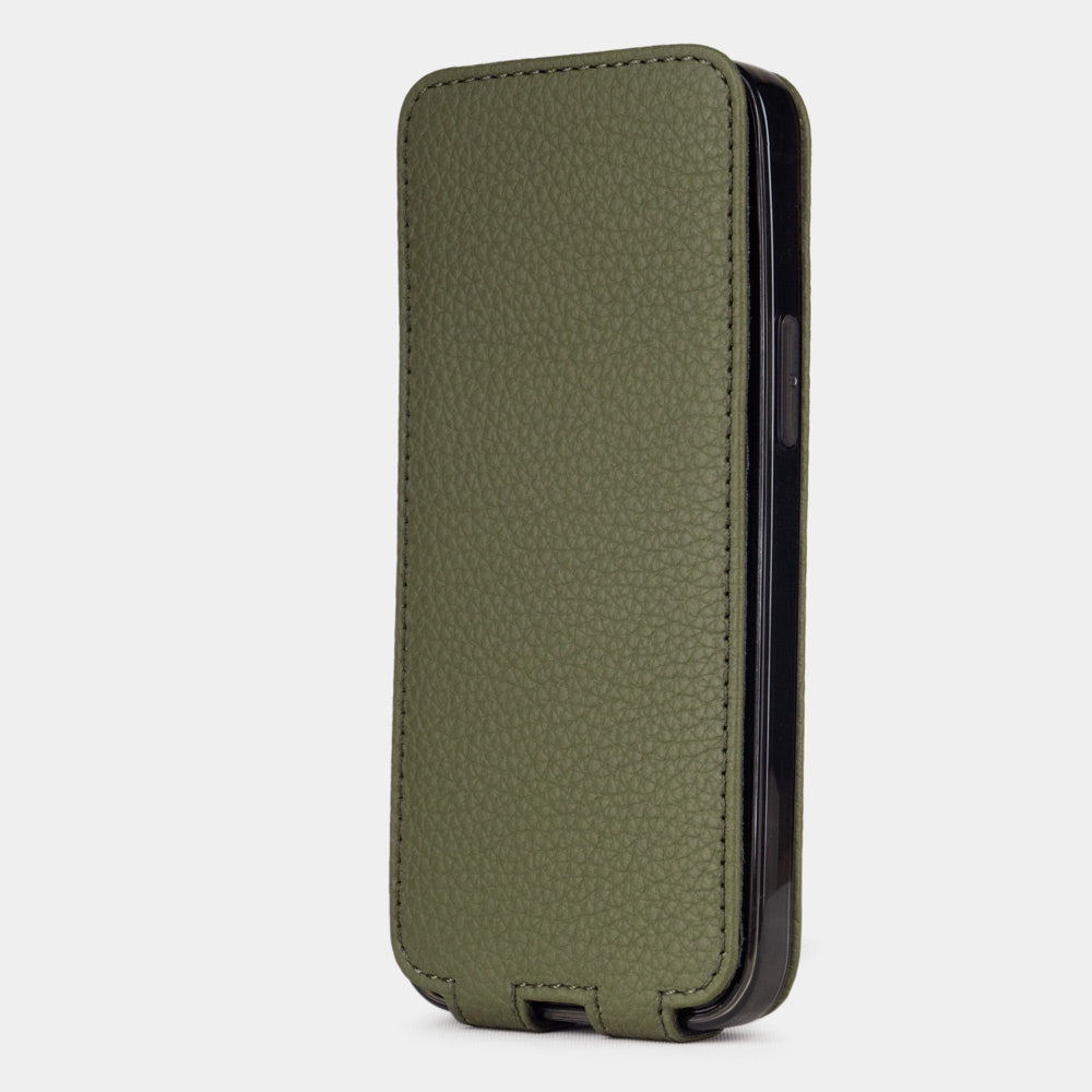 green leather iphone 12 mini flip case in an upright position, cover closes securely thanks to its integrated magnet system