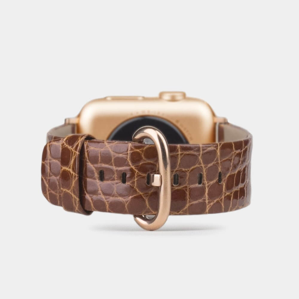 Strap for the Apple Watch 45/46 mm in Gold shiny alligator leather, with pink gold adapters and buckle | main view
