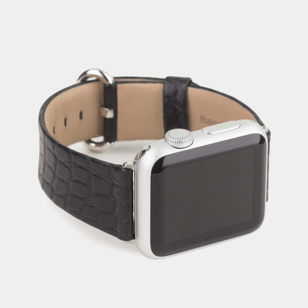 Strap for the Apple Watch 45/46 mm in black matte alligator leather, with steel adapters and buckle | 3/4 profile view to see the inner lining leather