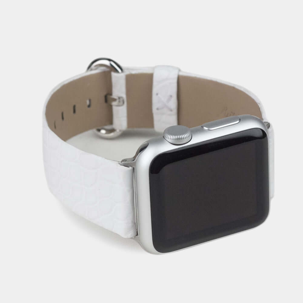 Strap for the Apple Watch 45/46 mm in white matte alligator leather, with steel adapters and buckle | 3/4 profile view to see the inner lining leather