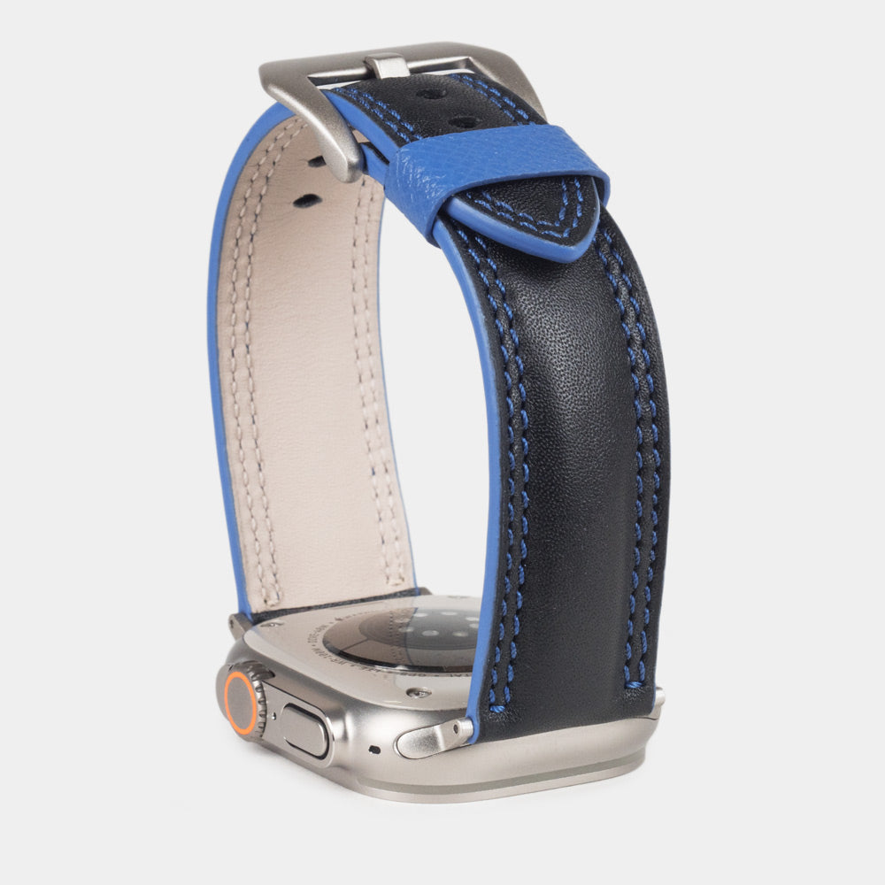Men's Apple Watch Ultra band 49mm in black smooth calfskin leather with blue edge finish and its titanium color adapters - band blue color edge view