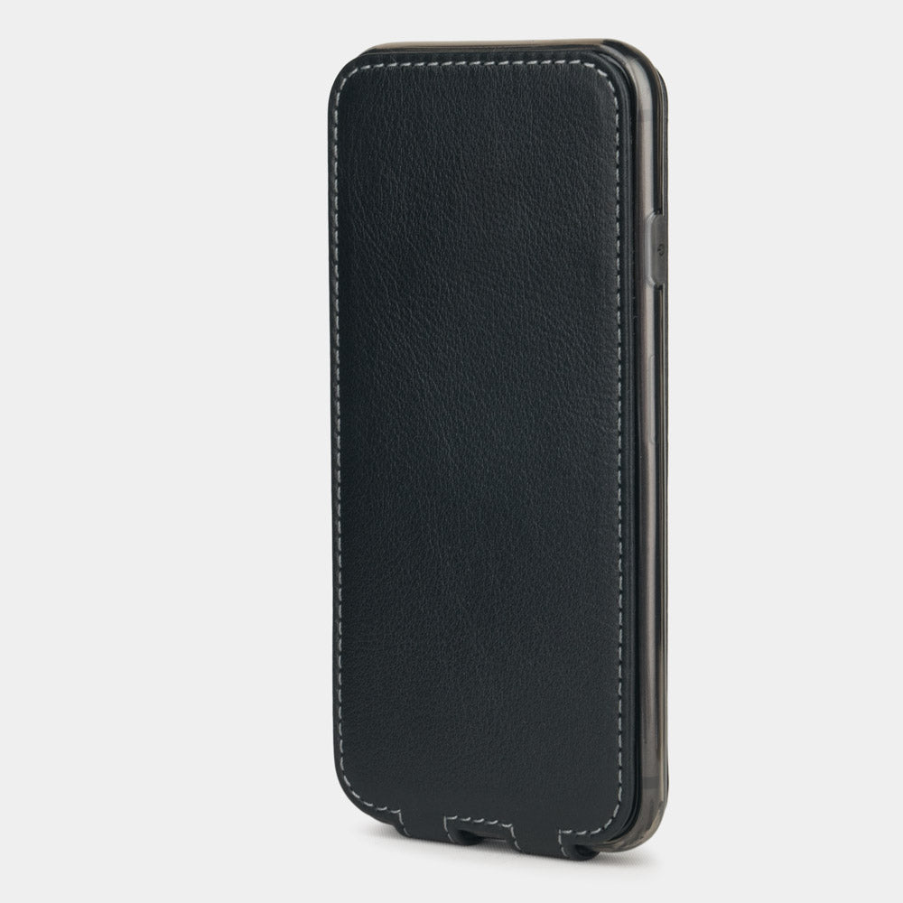 Black leather flip case for iPhone SE - upright closed view highlighting the magnetic front cover fully protecting the screen, elegant silhouette