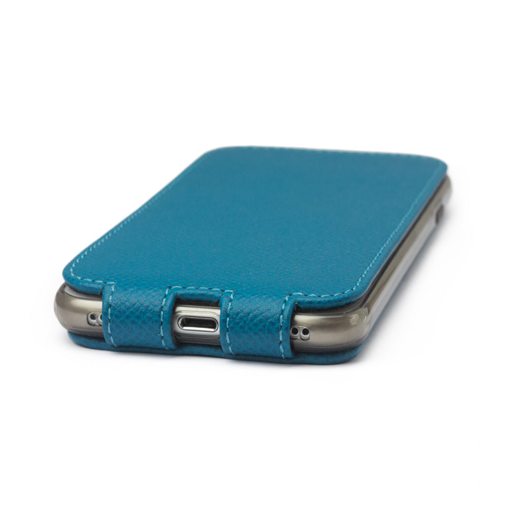 Aquamarine leather flip case for iPhone SE - flat side view displaying ultra-thin handcrafted design, Lightning port opening and precise edge finishing