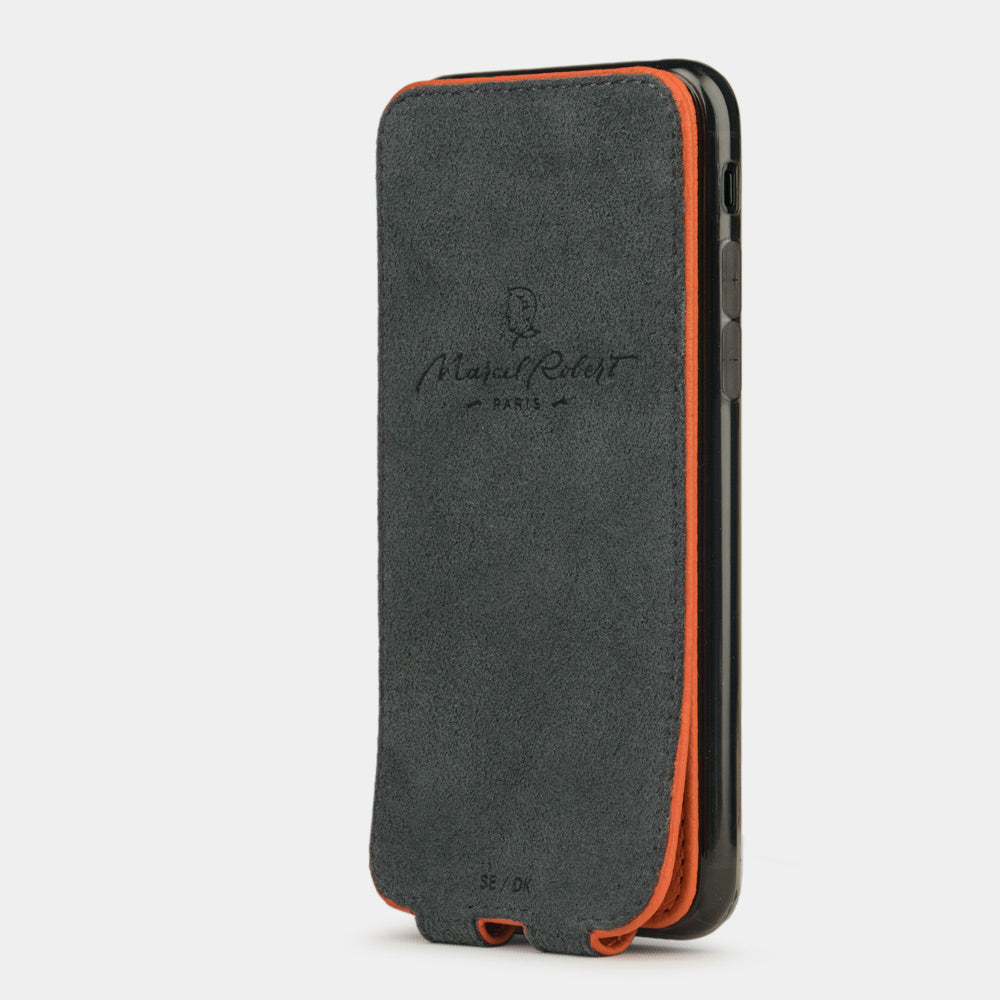 Orange leather flip case for iPhone SE - interior view showing grey Alcantara lining with magnetic closure, designed to clean and protect the screen