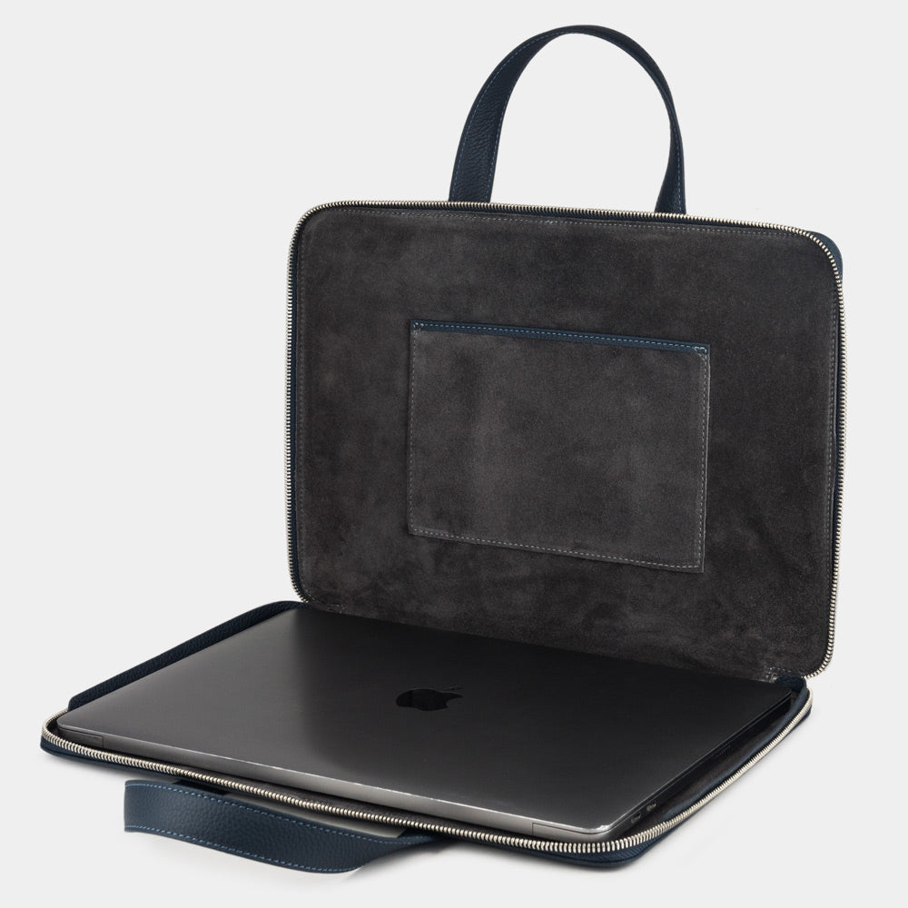 14 inch black leather laptop bag with pockets open showing laptop compartment and suede lining
