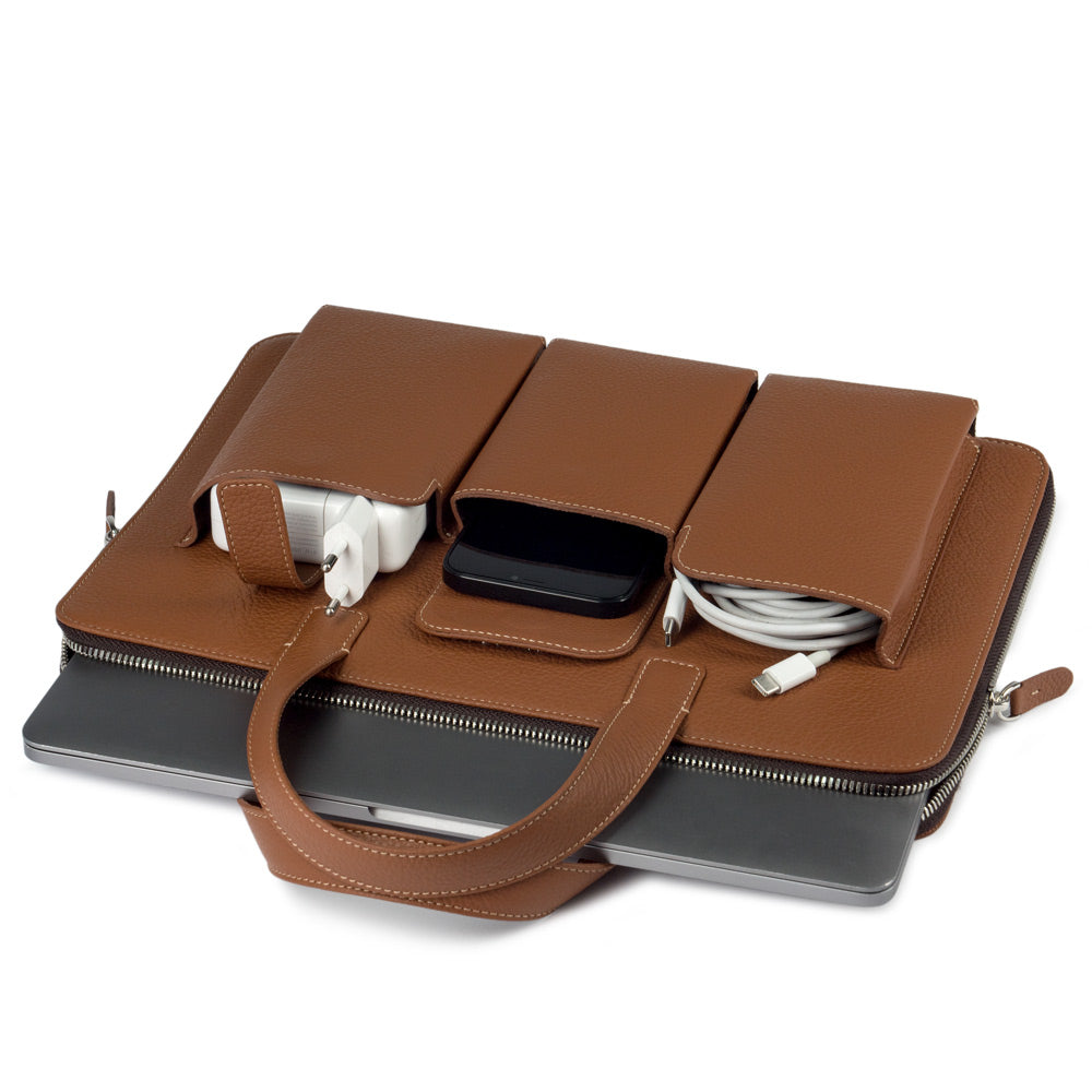14 inch gold leather laptop bag with pockets holding laptop and documents, organized business layout