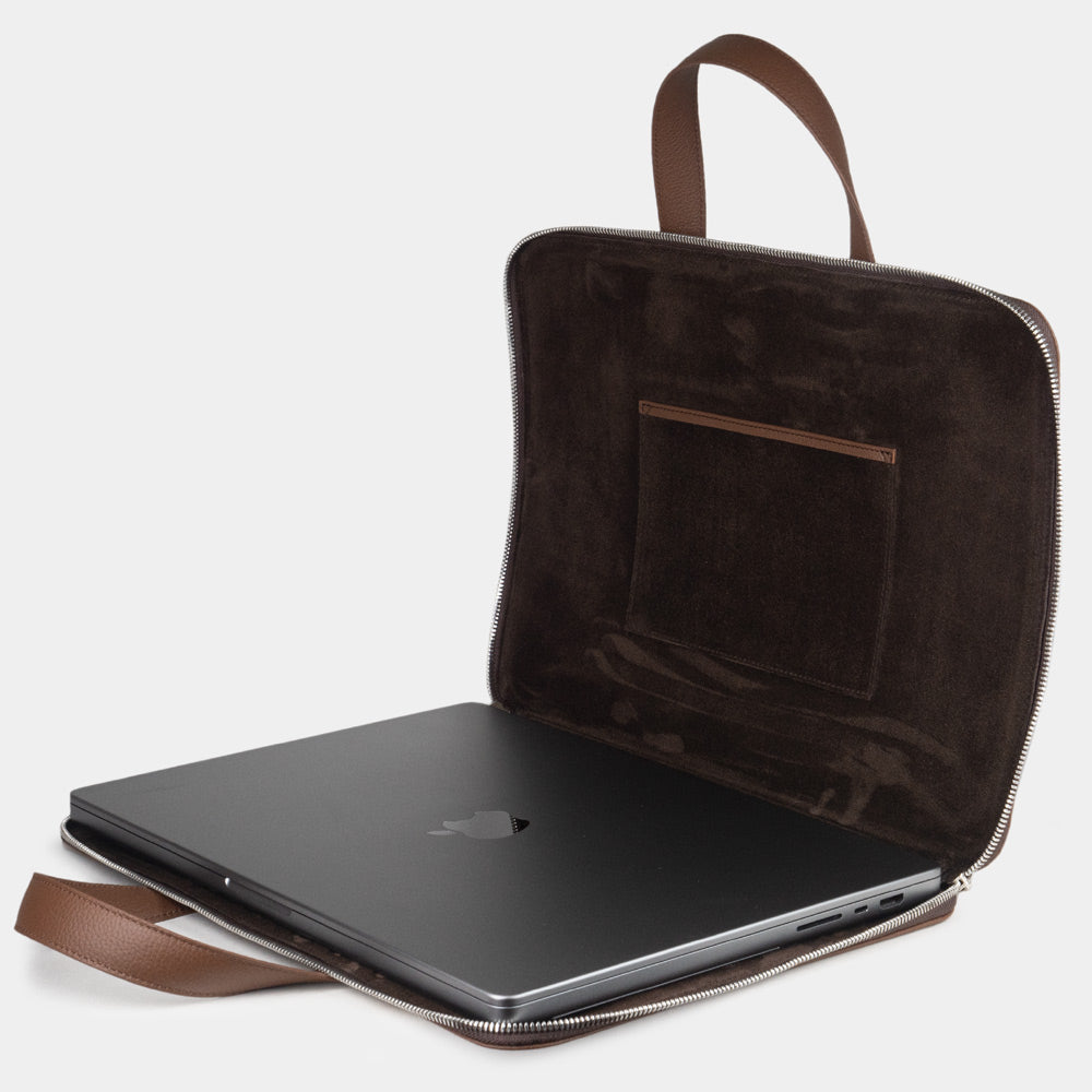 17 inch brown leather laptop bag slim profile with laptop inside, elegant business briefcase
