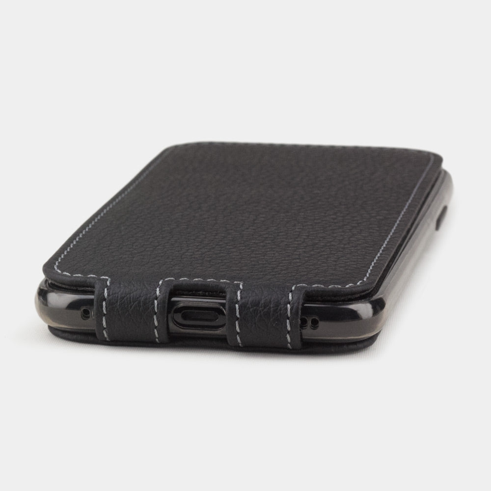 Matte Black leather flip case for iPhone XS Max - close-up of the bottom edge showing the Lightning port opening