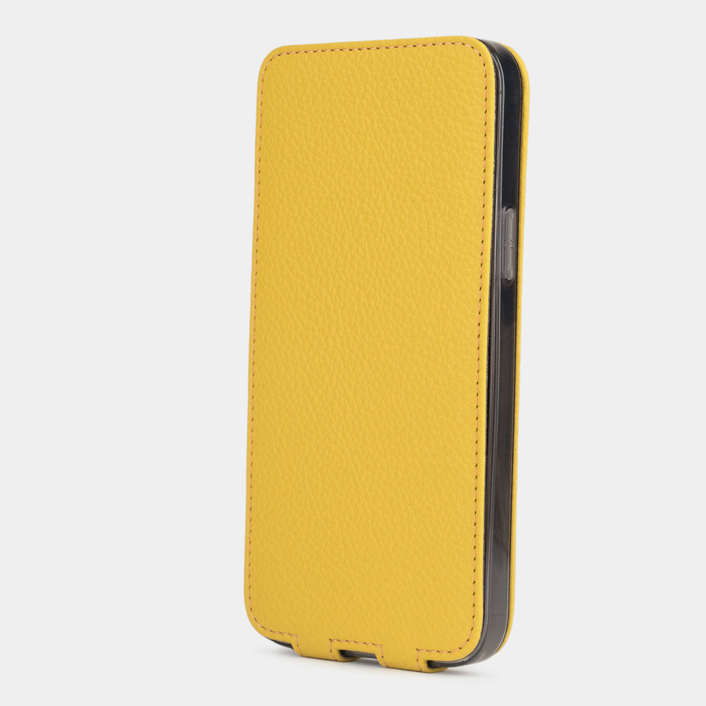 Yellow calfskin leather flip case for iPhone 15 Plus – flap closed flat, profile view with side buttons accessible