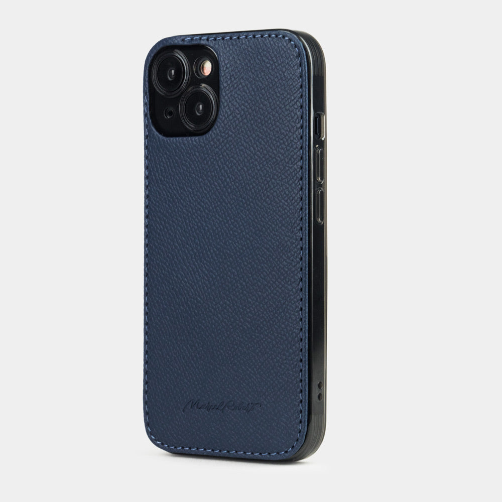 Blue Saffiano leather cover case for iPhone 15 Plus – three-quarter back view showing the ultra-thin 2 mm profile and hand-finished edges