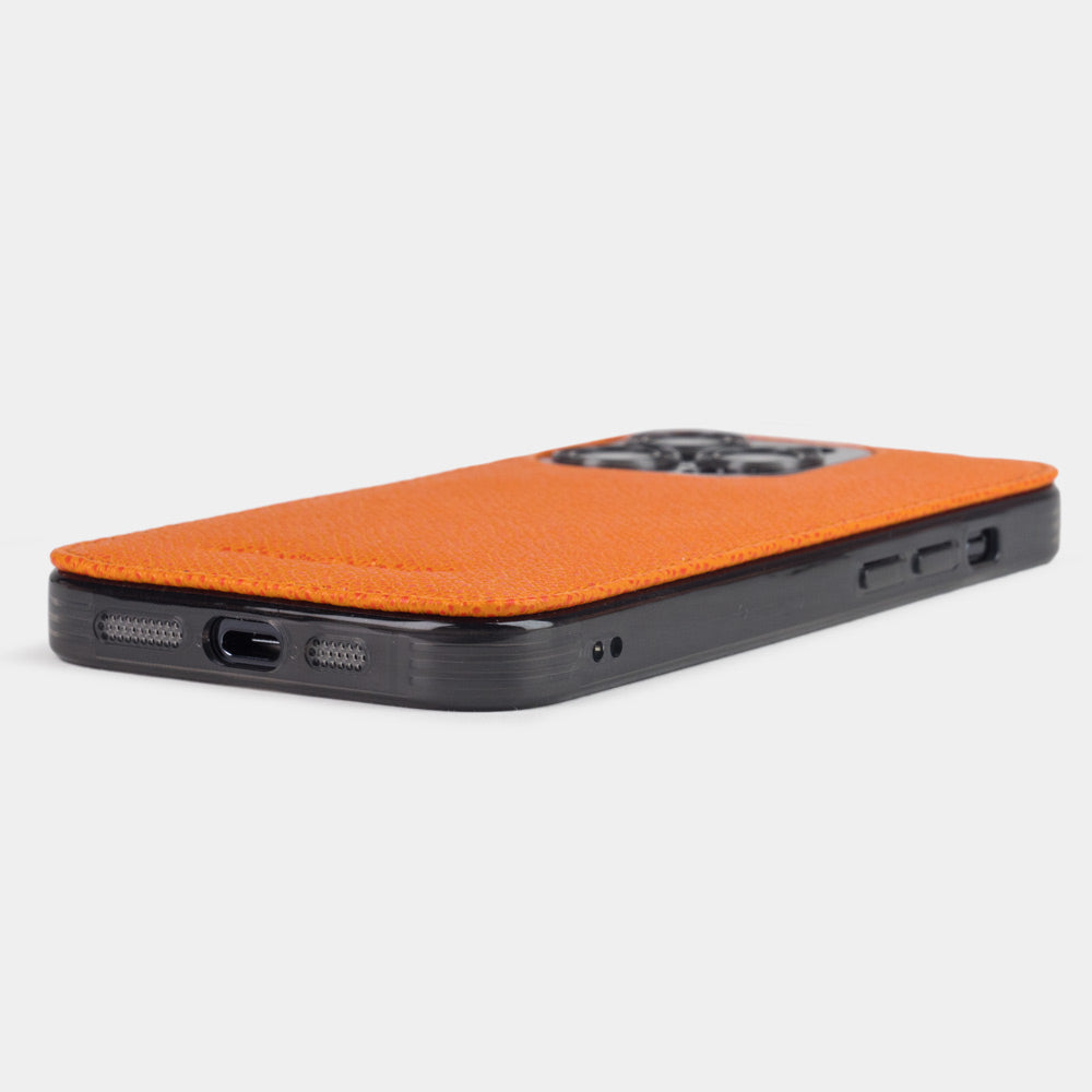 orange leather Cover Case iPhone 15 Pro Max - flat side view displaying ultra-thin handcrafted design, USB-C port opening and precise edge finishing