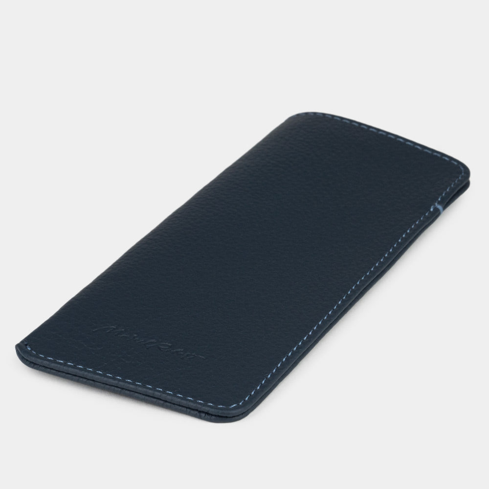Blue calfskin Pocket glasses pouch lying flat, three-quarter view
