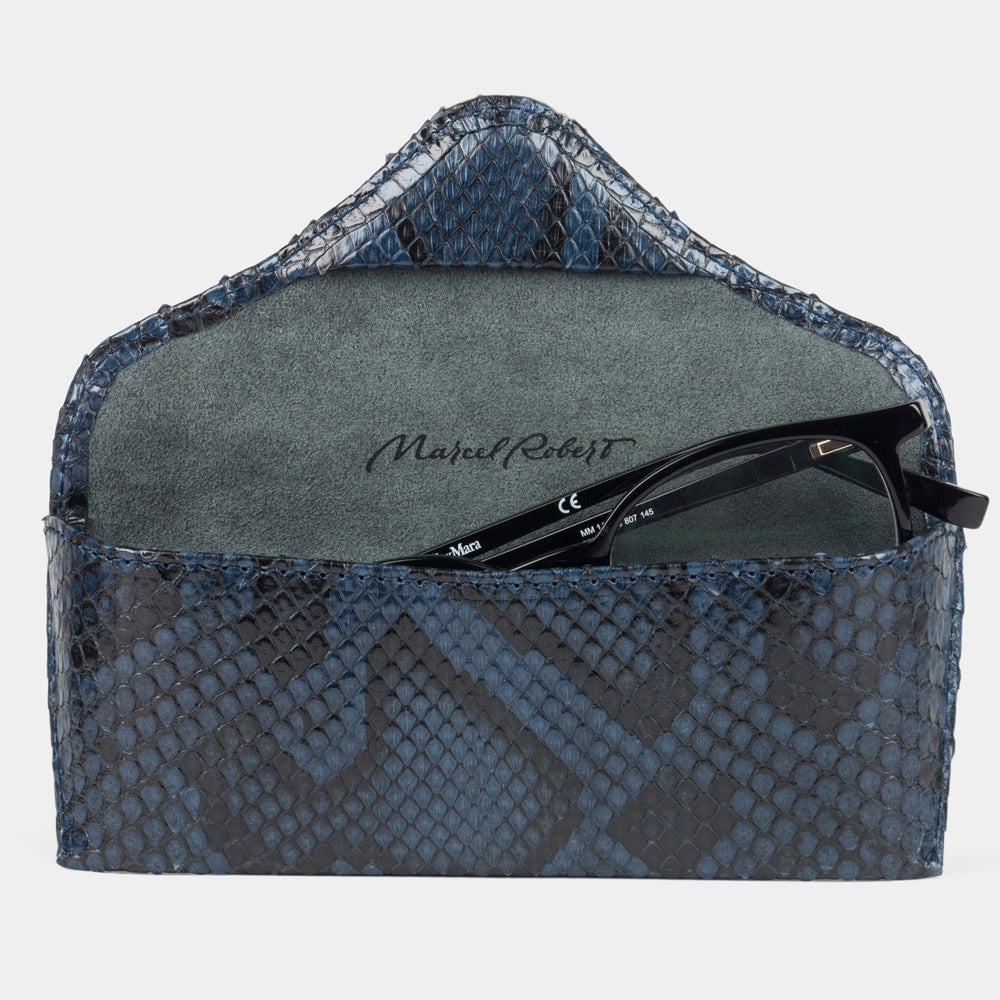 Casual glasses case in blue python leather, flap open with glasses inside