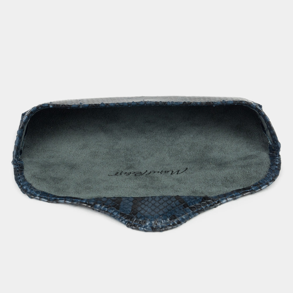 Inside the blue python leather Casual glasses case: natural suede lining