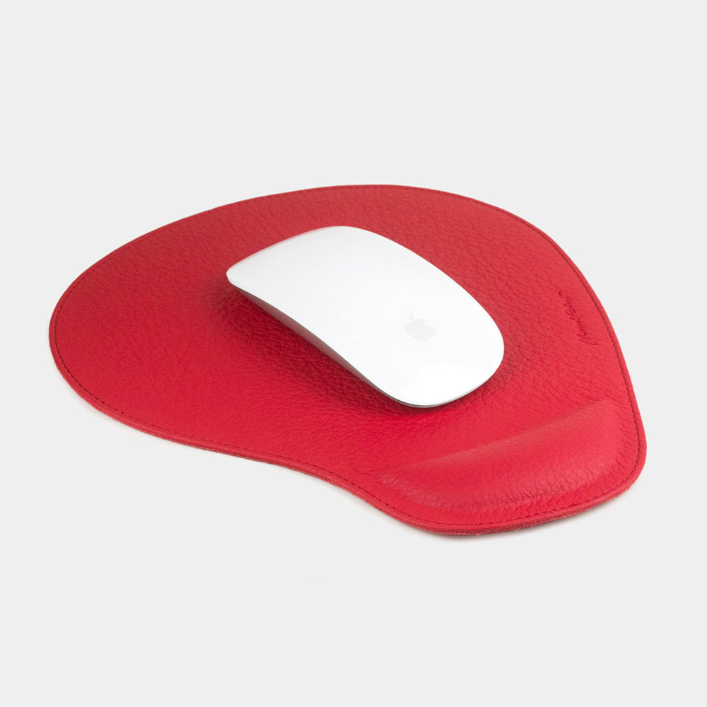 Red leather mouse pad with wrist rest, white mouse on grained calfskin