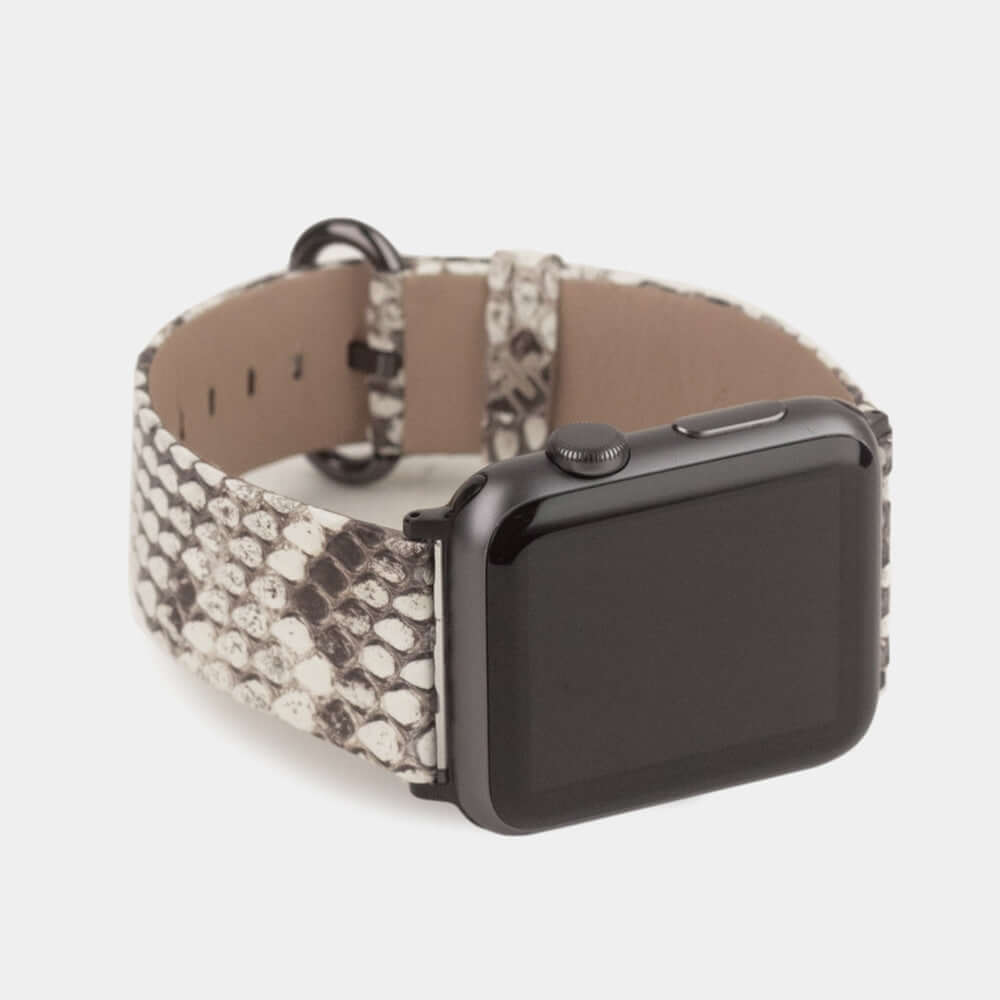Strap for the Apple Watch 41/42 mm in natural python leather, with black adapters and buckle | 3/4 profile view to see the inner lining leather