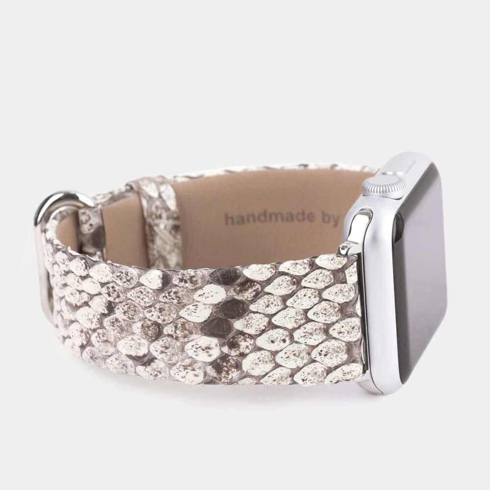 Strap for the Apple Watch 41/42 mm in natural python leather, with steel adapters and buckle | close-up on the inner lining leather and the brand stamp