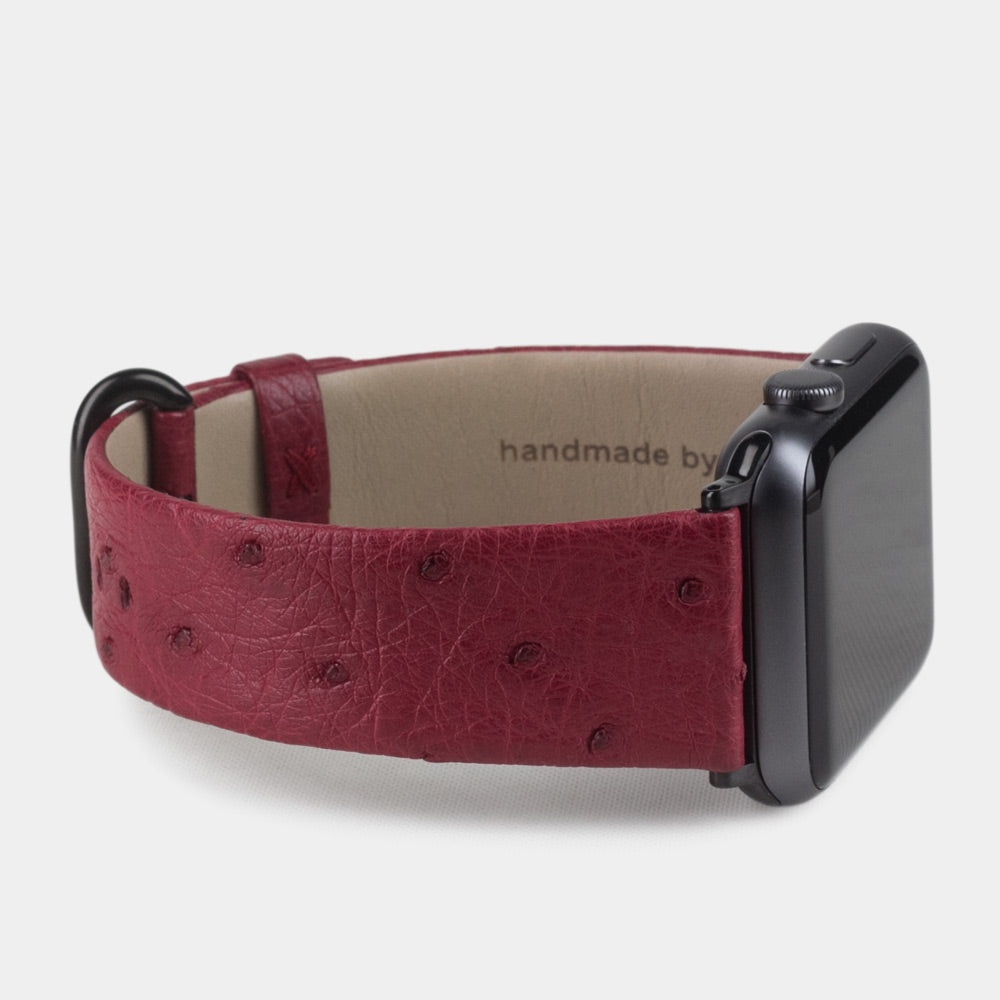 pink ostrich strap apple watch black adapters and buckle side view