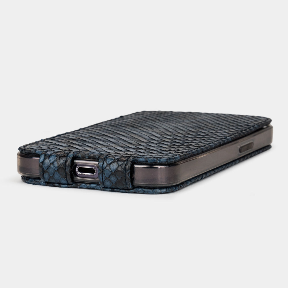 Blue python leather flip case for iPhone 15 Pro – bottom edge with the port opening and hand-finished edges