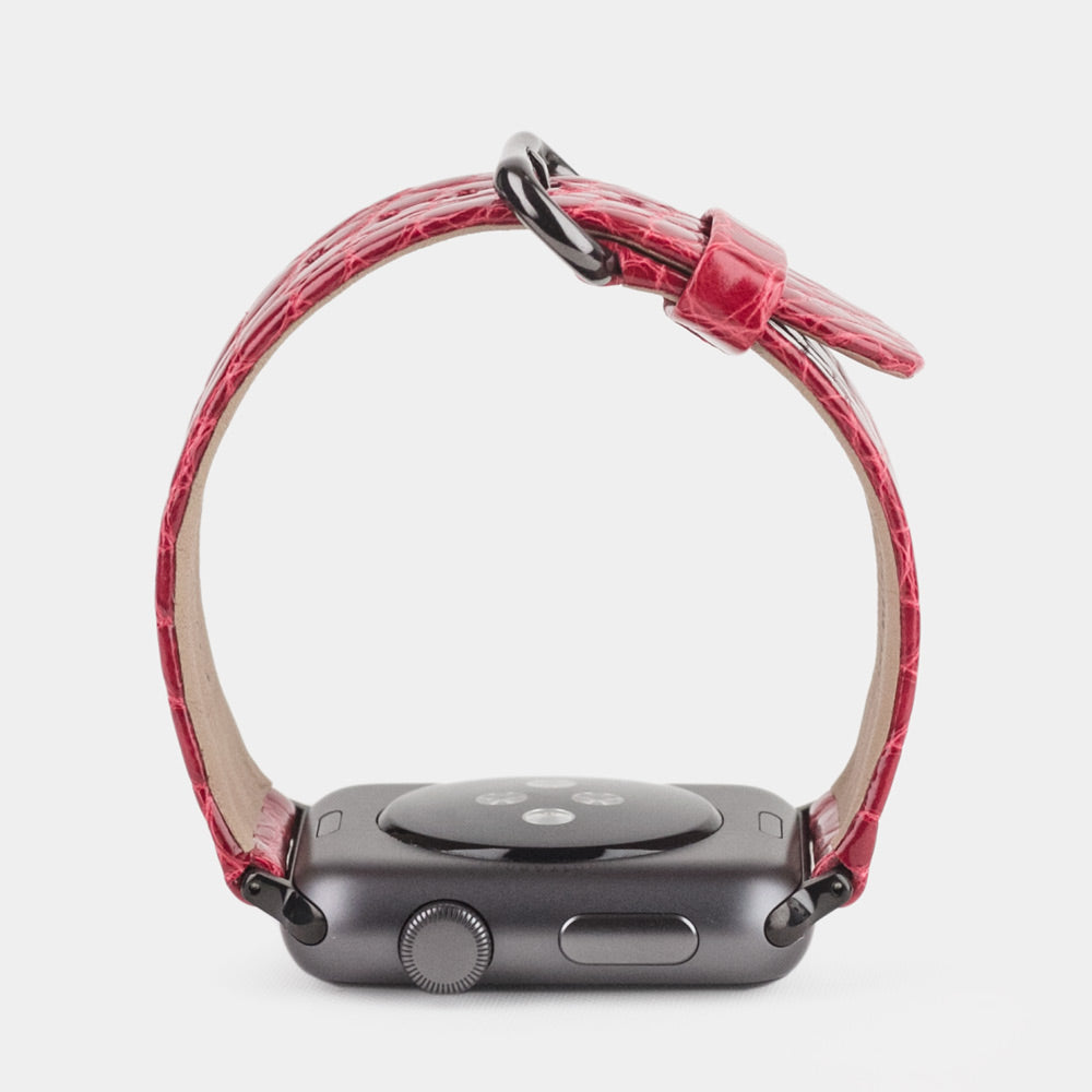 red alligator strap apple watch black adapters and buckle profile view