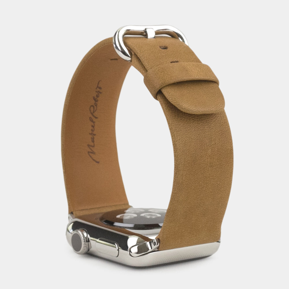 Strap for the Apple Watch 45/46 mm in vintage smooth calfskin leather, with steel adapters and buckle | watch case on bottom to see leather texture, inner lining and the buckle
