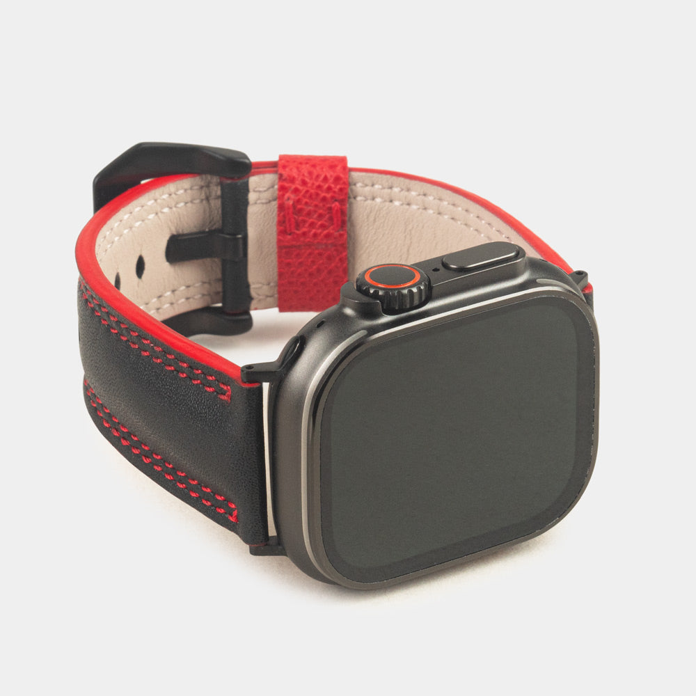 Men's Apple Watch Ultra band 49mm in black smooth calfskin leather with red edge finish and its black color adapters - front dial view