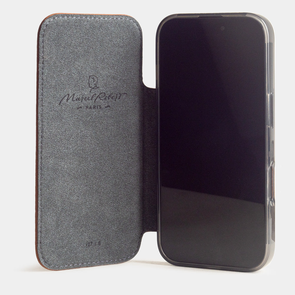 gold leather wallet case iPhone 17 - case with grey Alcantara lining shown open on smartphone