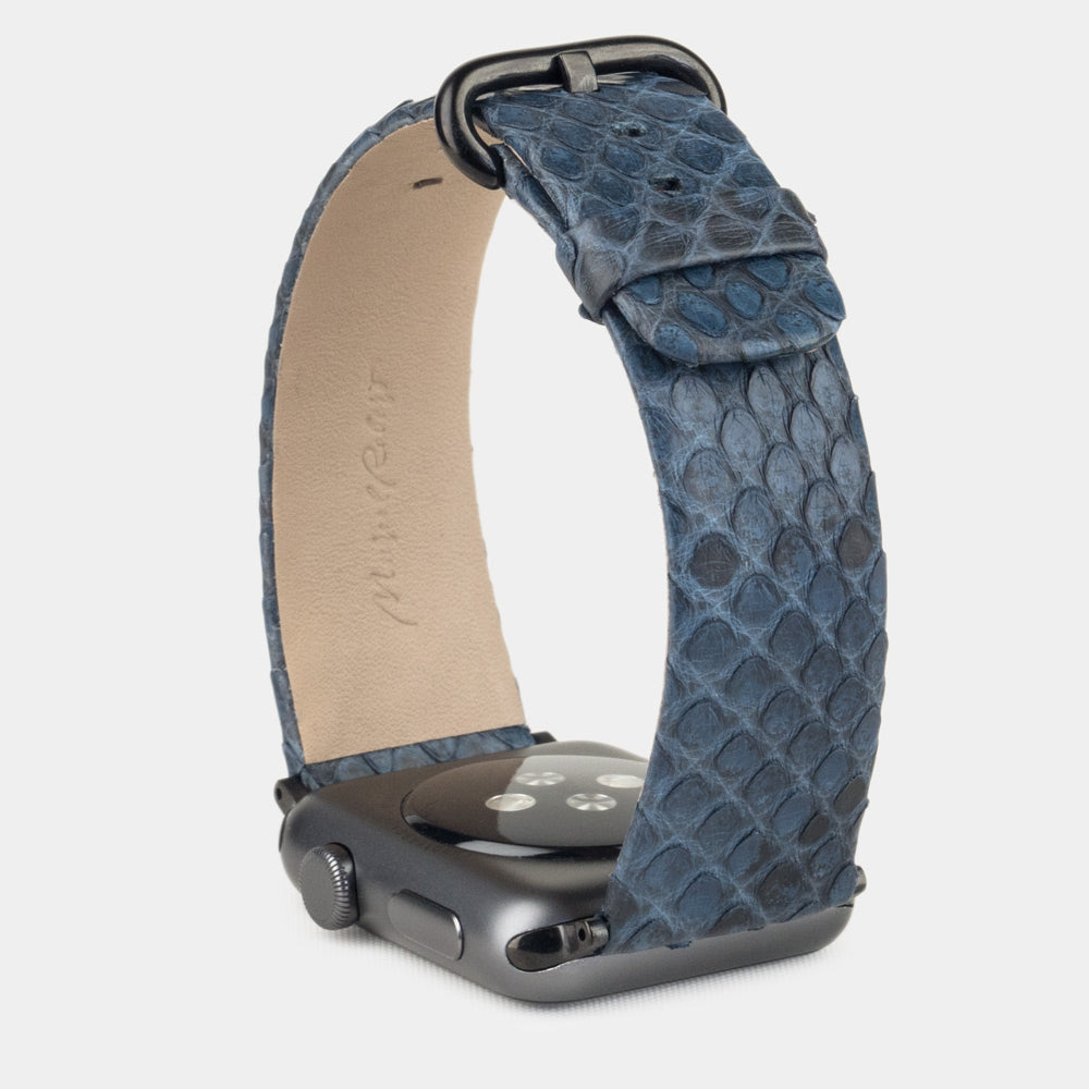 blue python strap apple watch with black adapters and buckle upper view
