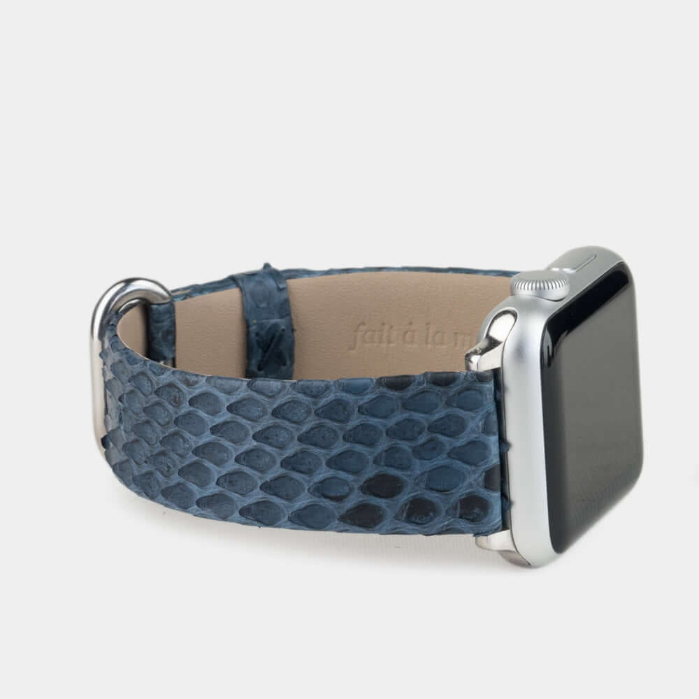 Strap for the Apple Watch 41/42 mm in blue python leather, with steel adapters and buckle | close-up on the inner lining leather and the brand stamp