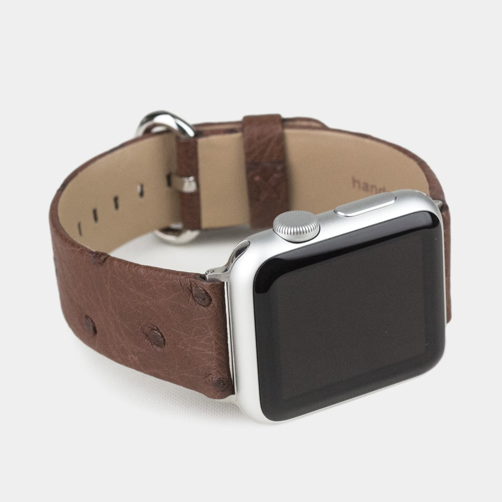 brown ostrich strap apple watch with steel adapters and buckle frontal view
