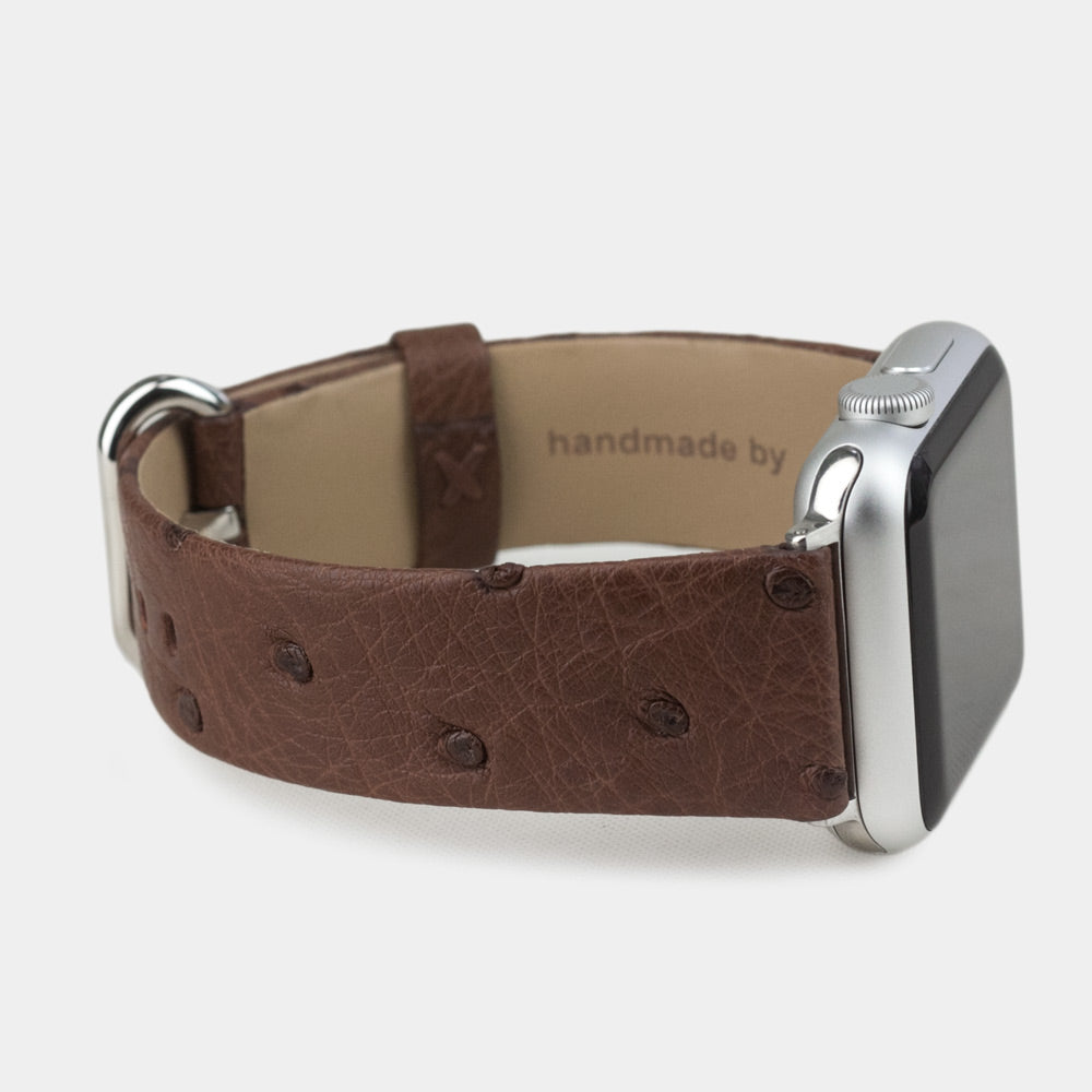 brown ostrich strap apple watch with steel adapters and buckle side view
