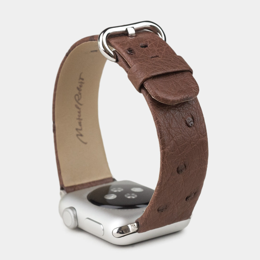 brown ostrich strap apple watch with steel adapters and buckle upper view