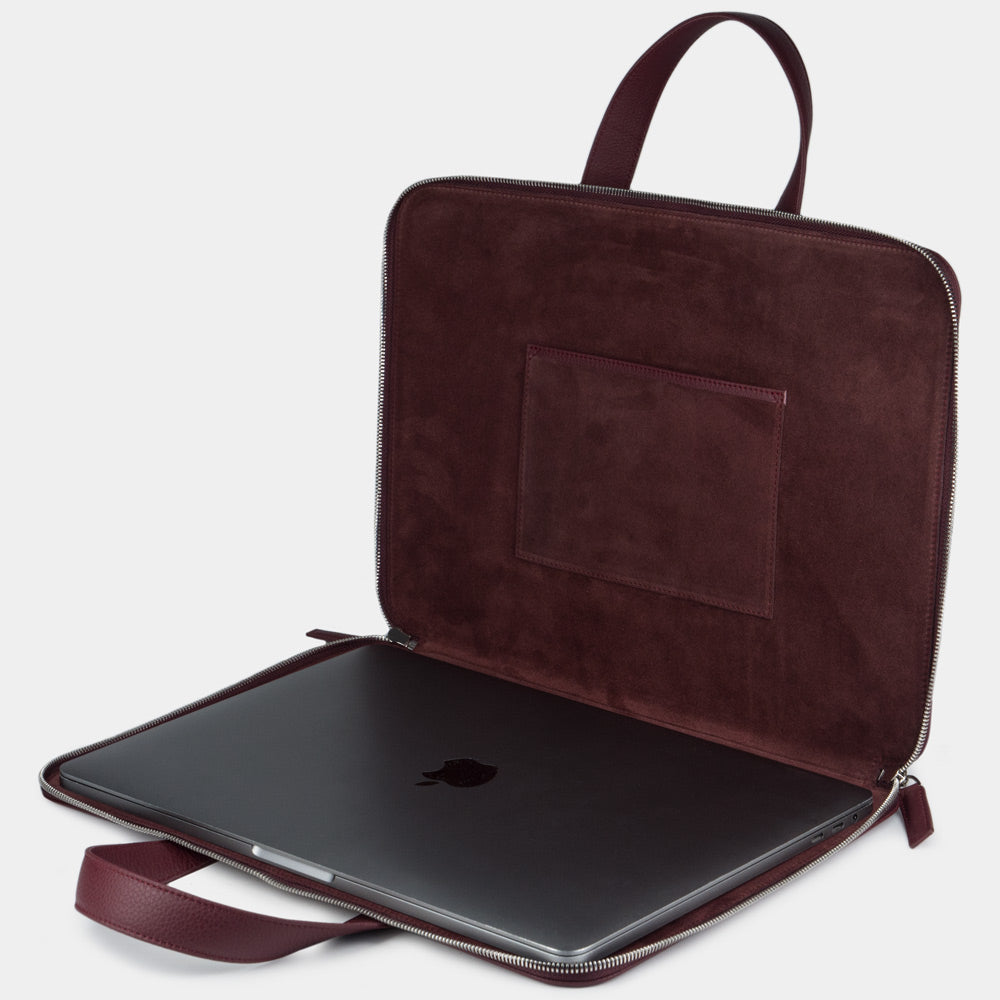 Bordeaux men’s 17 inch leather laptop bag with pockets open showing laptop compartment and interior lining