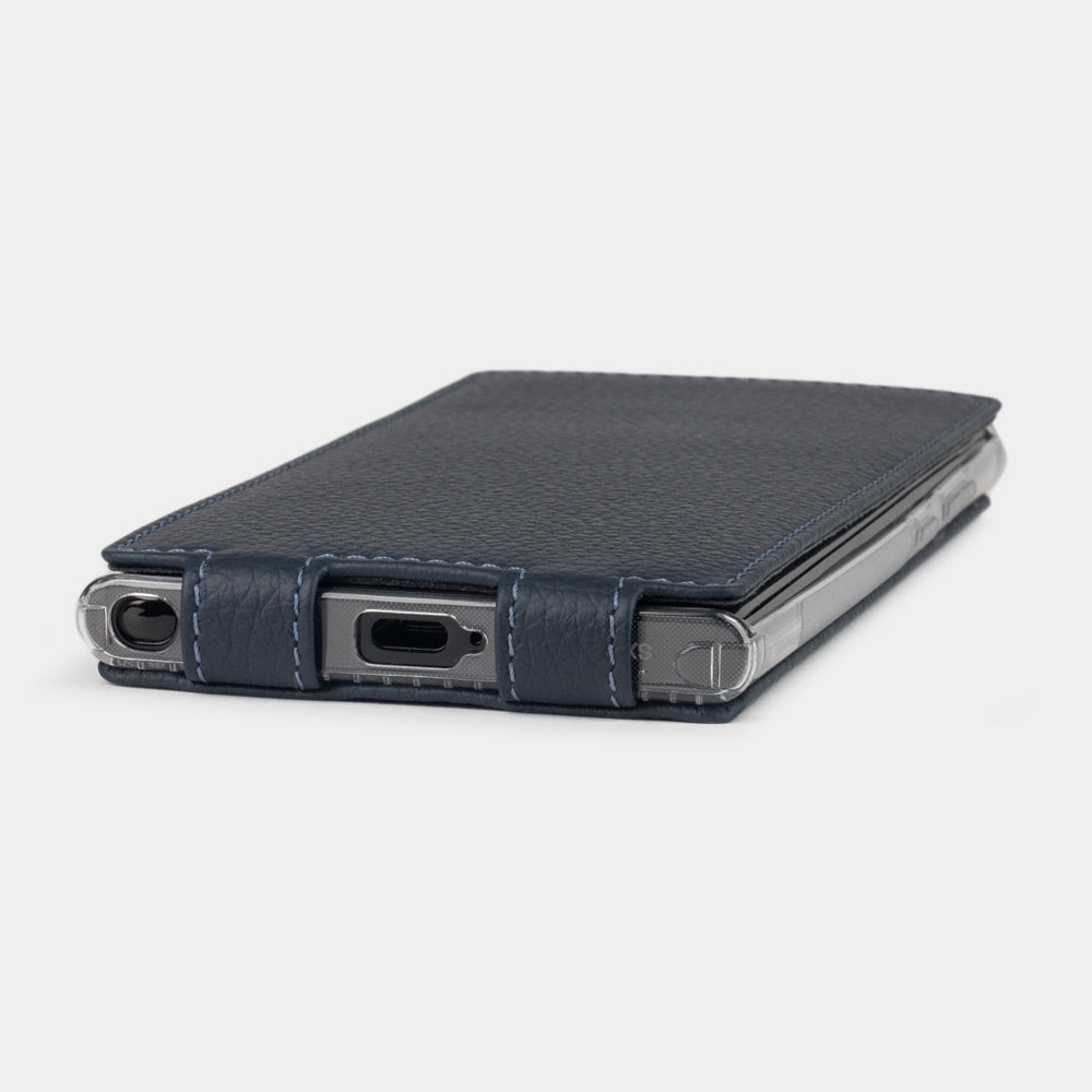 Side edge of the Samsung S24 Ultra blue leather case, USB-C port access with precise stitched leather finish