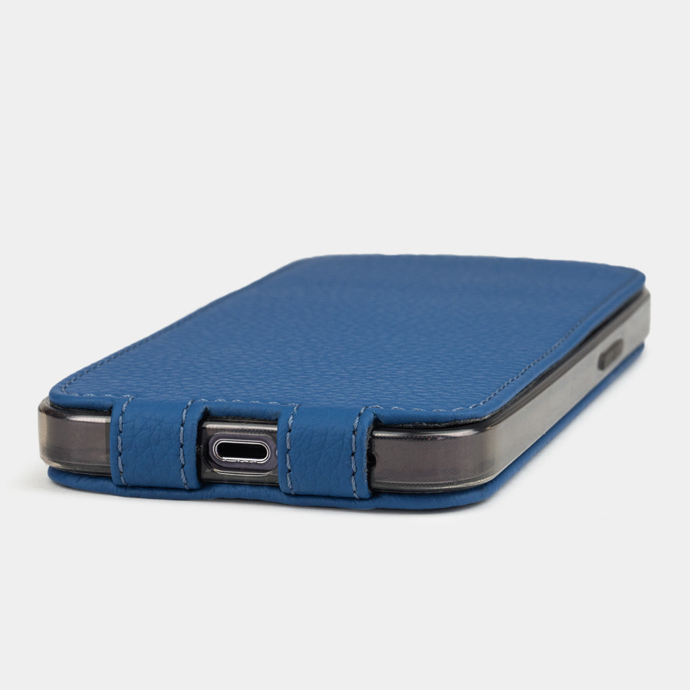 royal blue calfskin Case iPhone 16 - flat side view displaying ultra-thin handcrafted design, USB-C port opening and precise edge finishing