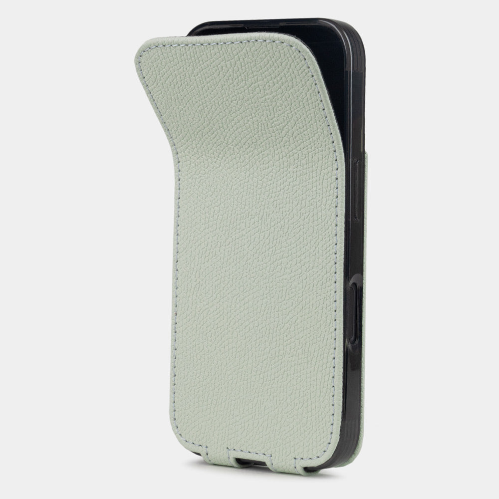 green pastel calfskin Flip Case iPhone 16 – phone flip case with textured natural scale pattern, flexible front cover folding back to protect the smartphone screen