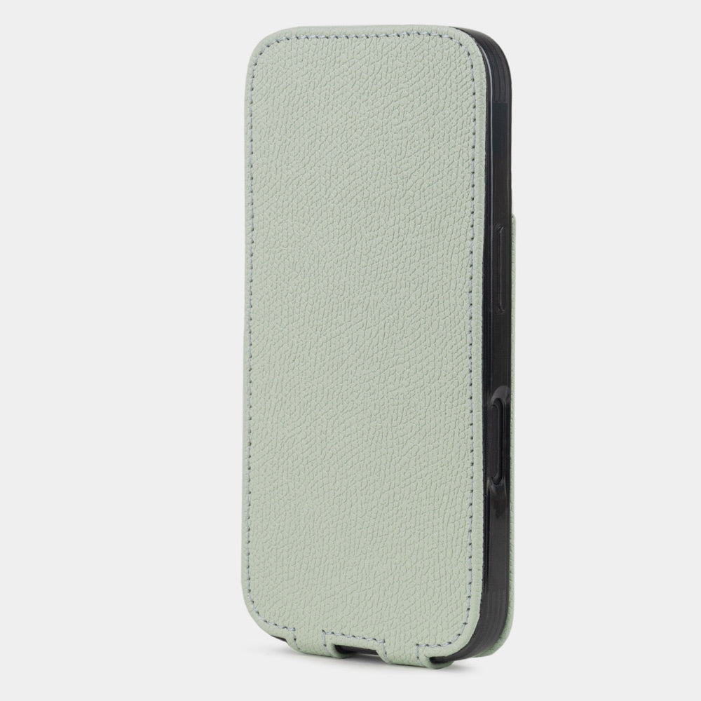 green pastel Calfskin Flip Case iPhone 16 – upright closed view highlighting the magnetic front cover fully protecting the screen, elegant silhouette