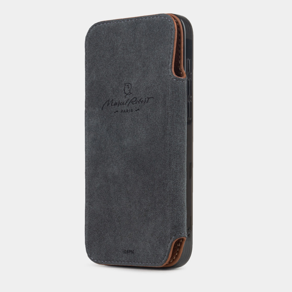Open folio view of Marcel Robert iPhone 17 folio case in gold calfskin leather, grey Alcantara cover folded back and held with integrated magnets