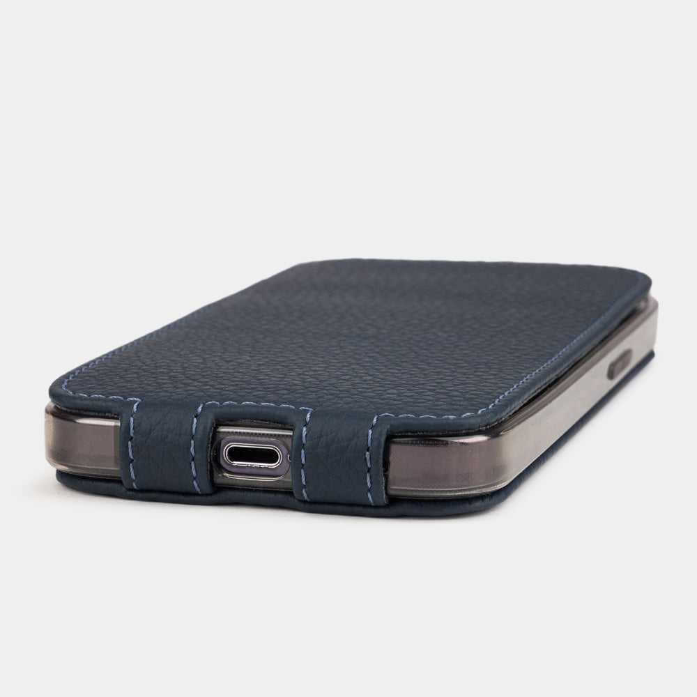 iPhone 14 Pro Max flip case made with blue premium leather – the case laid flat, showing the precise charging-port cut-out and how slim it stays